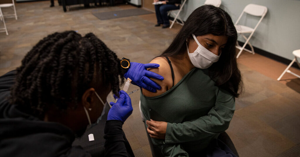 As Omicron Spreads, Officials Ponder What It Means to Be ‘Fully Vaccinated’